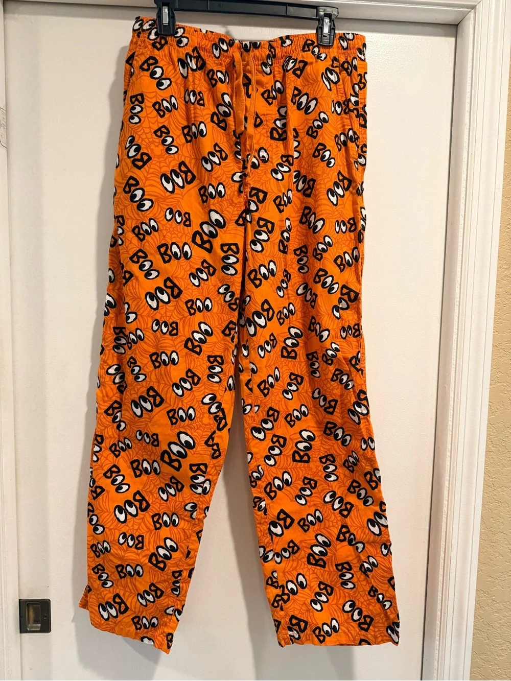 Disney Parks Unisex Sz M Orange Pajama Pants Halloween Boo Eyes
Haunted Mansion - Picture 5 of 5